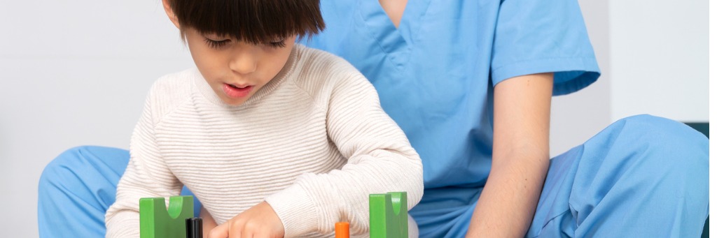 Child playing with building blocks.